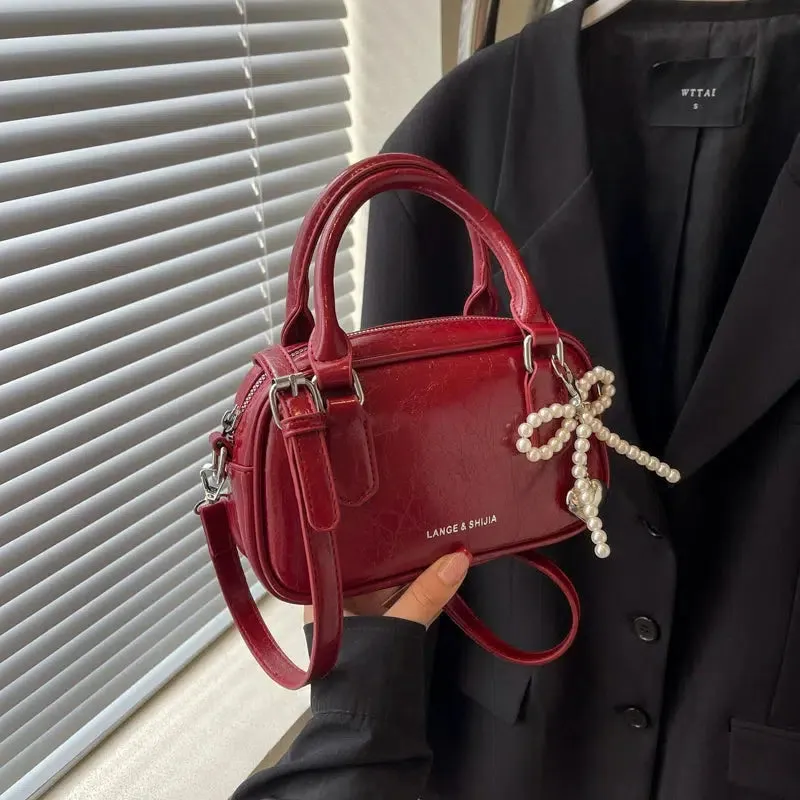 Bow Mini Leather Crossbody Bag