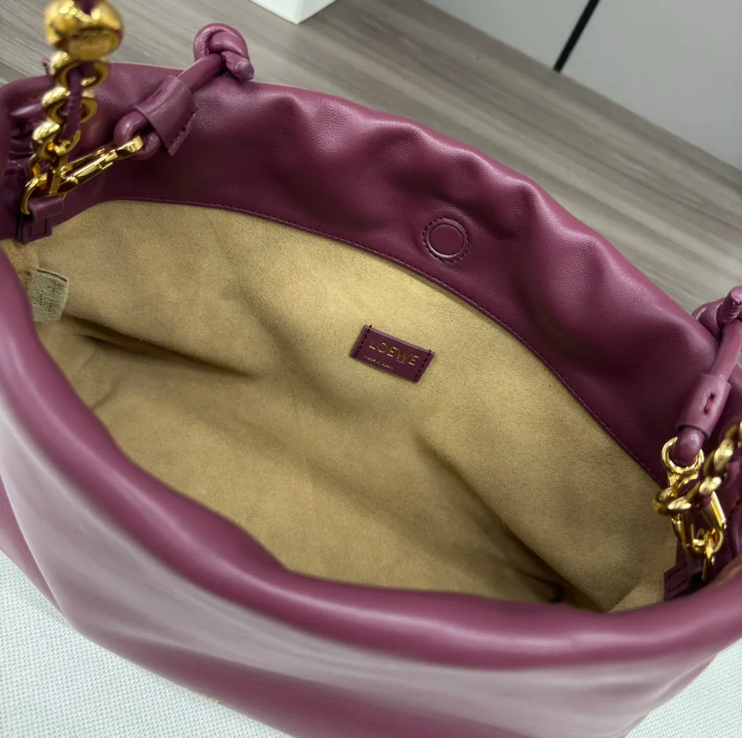 LOE MEDIUM 30 FLAMENCO PURSE BUCKET IN PLUM PURPLE LAMBSKIN